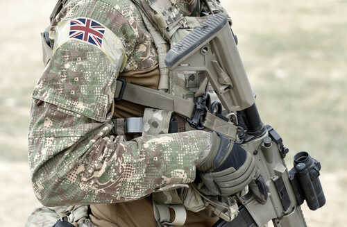 Soldier,With,Assault,Rifle,And,Flag,Of,United,Kingdom,On