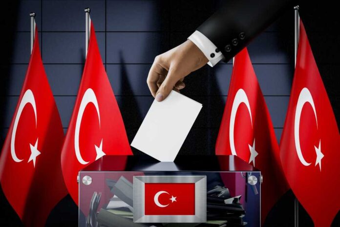 Turkey,Flags,,Hand,Dropping,Ballot,Card,Into,A,Box,-