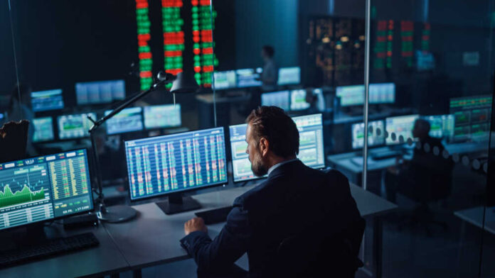 Professional,Financial,Data,Analysts,Working,In,A,Modern,Monitoring,Office
