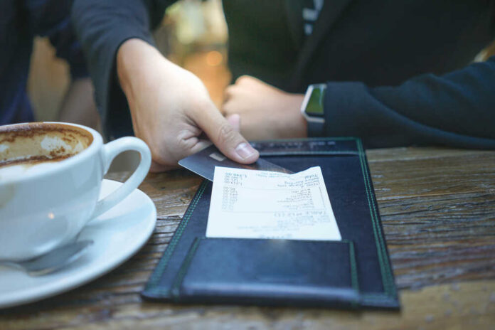A,Businessman,Is,Paying,His,Bill,By,Credit,Card,At