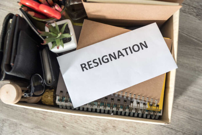 Letter,Of,Resignation,And,Cardboard,Box,On,The,Desk.,Concept