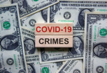 Fraud Frenzy: $1B Stolen in Pandemic Chaos COVID-19 CRIMES on blocks, surrounded by dollar bills.