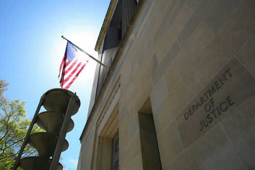 United States flag Department of Justice building exterior