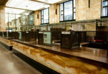 Swiss Bank CRUSHED—Funneled $100M to Iran Interior of a historic bank with marble walls and empty counters