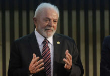 guy with gray hair and a suit