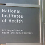 Sign for the National Institutes of Health displaying its affiliation with the U.S. Department of Health and Human Services