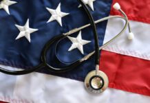 A stethoscope resting on an American flag