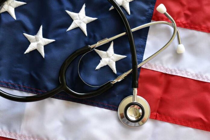 shutterstock_2276824243.jpg A stethoscope resting on an American flag