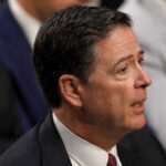 Comey Dragged Back: Will Russia Probe Finally Explode? A man in a suit speaking during a government hearing