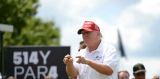 man in maga cap