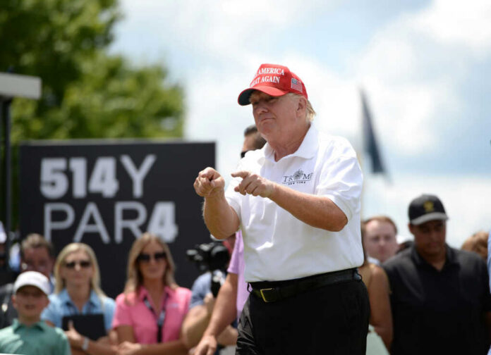 man in maga cap