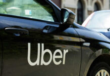 Black car with Uber logo on side door