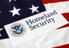 Homeland Security sign on American flag background