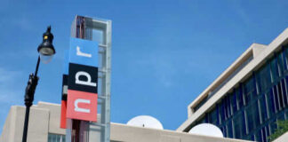 NPR building with logo and streetlight nearby