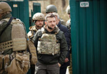 Ukraine’s Robot Army Surges — 9,000 Missions! Group of soldiers, including Volodymyr Zelenskyy, wearing tactical gear.