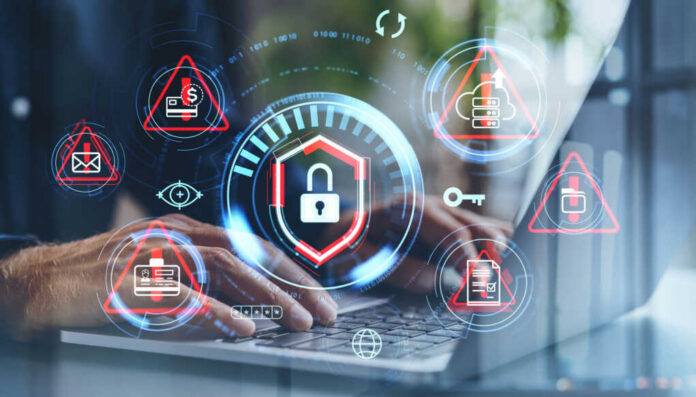 Hands typing with cybersecurity icons overlayed