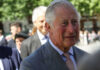 King Charles’ GREEN PUSH at Chelsea Flower Show! elderly man in a gray suit smiling outdoors