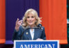 Woman speaking at a podium with microphone