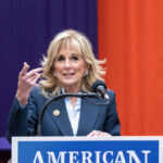 “Jail Was Not an Option” — Jill Biden on Hunter Pardon Woman speaking at a podium with microphone