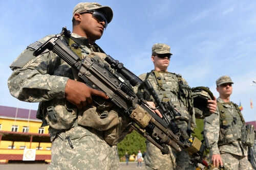 military-army-soldiers2491189835jpg Soldiers in uniform holding weapons outdoors on sunny day