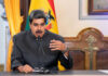 Maduro’s Ally EXTRADITED—DOJ Corruption Bombshell! Man speaking at a podium with microphone
