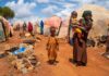 Natural Disasters Push Somalia to the Brink of Famine Children in a makeshift camp on a dry, dusty ground