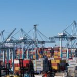 Federal Probe: Did China Manipulate Supply Chain? Cranes and shipping containers at a busy port