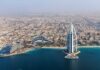 UAE’s $55B Oil Play: Global Energy Shake-Up! Aerial view of Dubai featuring the Burj Al Arab and surrounding buildings