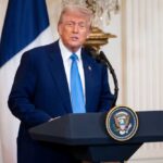 Trump CONFRONTS Xi—Democracy Hero’s Fate Hangs Donald Trump delivering a speech at a podium in the White House