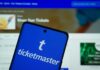 Congress Takes Aim at Ticketmaster Monopoly Mobile phone displaying the Ticketmaster app with event details in the background