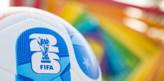 Close-up of a FIFA World Cup soccer ball with a colorful background