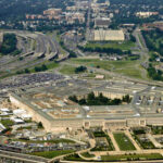 Pentagon’s Submarine Revelation: Strategic Masterstroke? Aerial view of the Pentagon surrounded by roads and greenery