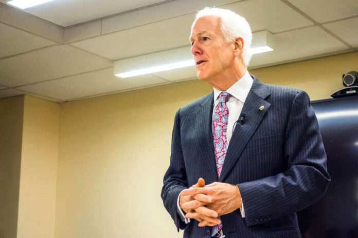 Washington,Dc,-,Circa,January,2015:,United,States,Senator,John A man in a suit delivering a speech in a conference room