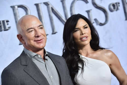 bezos-sanchez2192862493 A man and woman at a formal event.