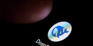 Finger touching phone screen showing DeepSeek logo