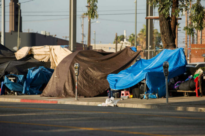homeless-encampments1495413719jpg Street tents and tarps along a sidewalk