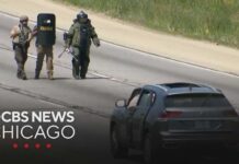 Massive police presence continues on Eisenhower Expy. after person is found dead in SUV