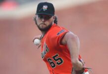 MLB Backlash Erupts Over Bible Caps SF Giants players draw backlash after writing Bible verses on Pride Night caps