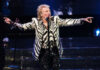 Outrage Mob Misfires on Rod Stewart Man performing on stage wearing zebra-print outfit