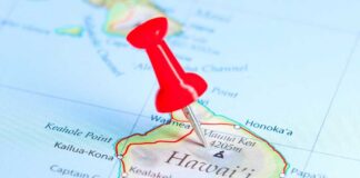 A red pushpin marking a location on a map of Hawaii