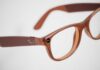 Meta Smart Glasses Face Privacy Backlash Brown plastic eyeglasses with clear lenses on a white background