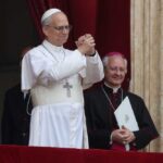 Pope Urges Spain to Defend Human Life in Parliament Address Pope giving a blessing from a balcony