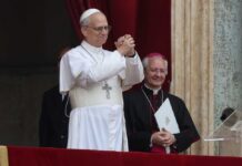 Pope Urges Spain to Defend Human Life in Parliament Address Pope giving a blessing from a balcony