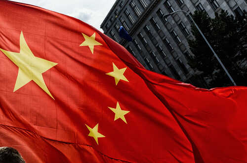 Prague,,Czech,Republic,-,March,,28th,2016:,Chinese,President,Xi Close-up of the Chinese flag waving in the wind