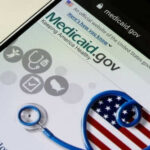 Blue States Revolt Over Medicaid Work Crackdown Medicaid website displayed on a smartphone screen