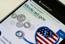 Blue States Revolt Over Medicaid Work Crackdown Medicaid website displayed on a smartphone screen