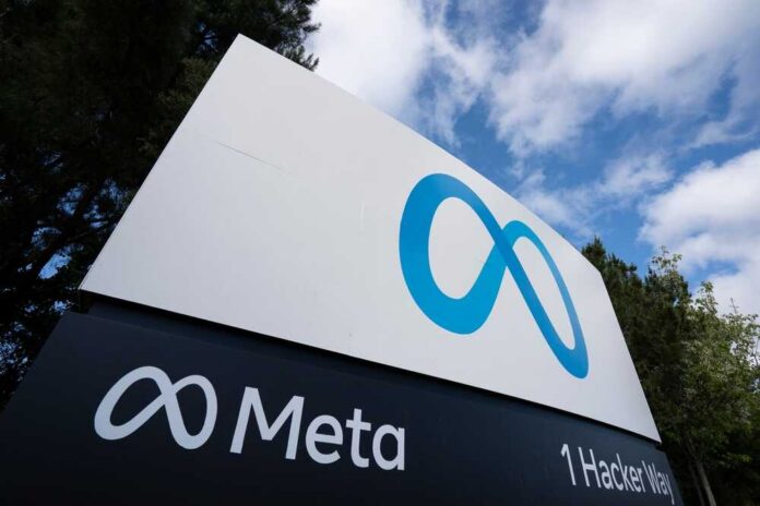 Sign displaying the Meta logo and address at 1 Hacker Way