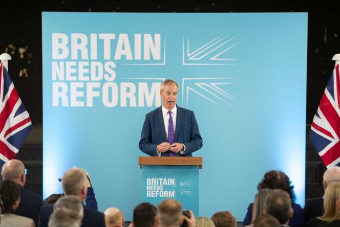 Merthyr,Tydfil,,Wales,,Uk.,June,17,2024:,Nigel,Farage,,Leader A politician delivering a speech at a podium with British flags in the background