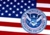 U.S. immigration and customs enforcement seal on American flag