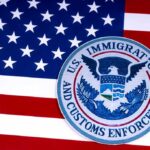 U.S. immigration and customs enforcement seal on American flag